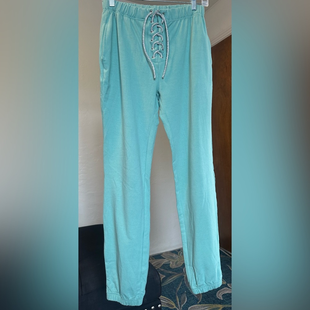 sweatpants with a rhinestone ribbon
